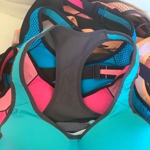 Lot of 8 Victorias Secret sport bras 34B. Padded